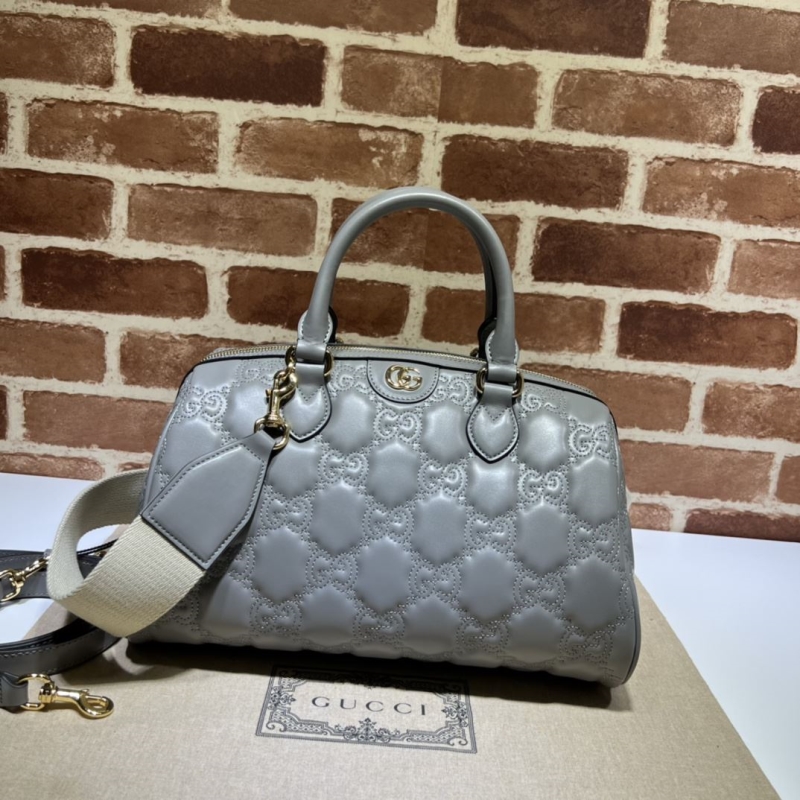 G*u*i top handle bags